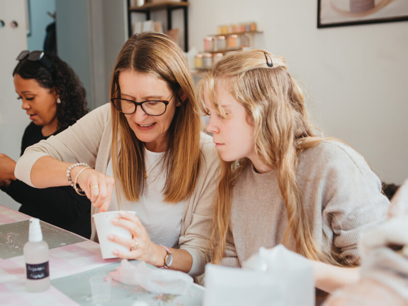 Mum and daughter at a perfume making class